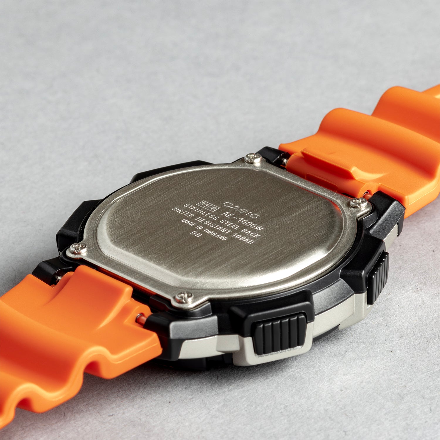 CASIO カシオ AE-1000W-4B オレンジ ブラック文字盤 デジタル メンズ 腕時計 ケースバック