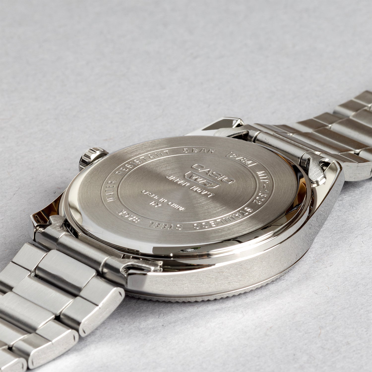 CASIO カシオ MTP-1302DA-2A1 シルバー ブルー文字盤 アナログ メンズ 腕時計 ケースバック